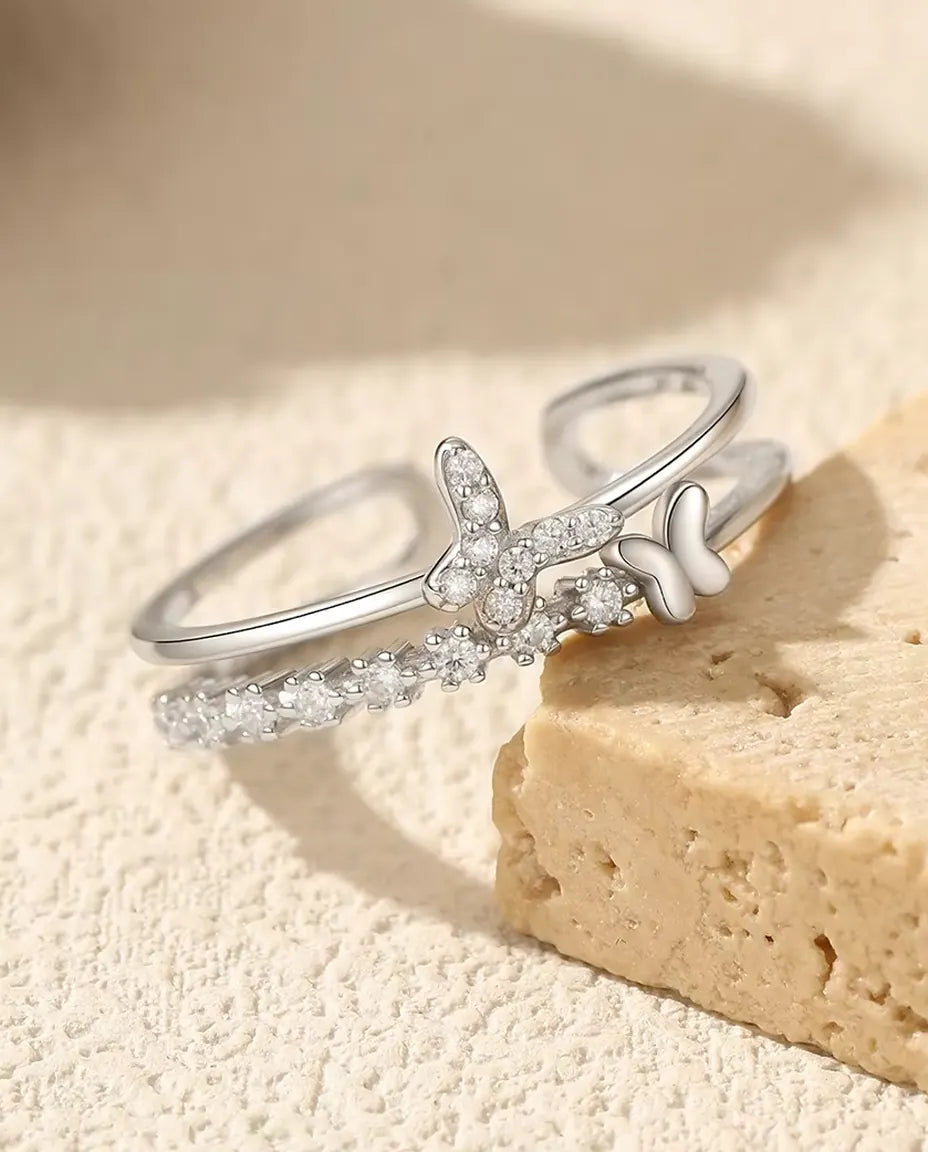 Anello farfalla con zirconi - due farfalle su filo doppio con linea a pavé, regolabile, argento 925, US 6-9