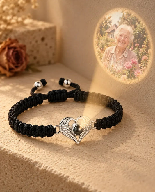 Bracciale con Foto Dentro Cuore con Ali d'Angelo - proietta la foto nascosta sul muro