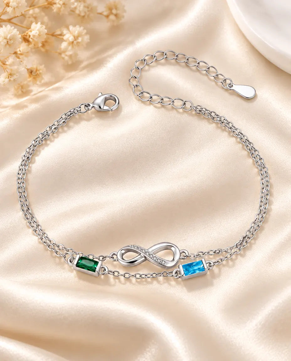 Bracciale infinito personalizzato con due pietre di nascita baguette su doppia catena