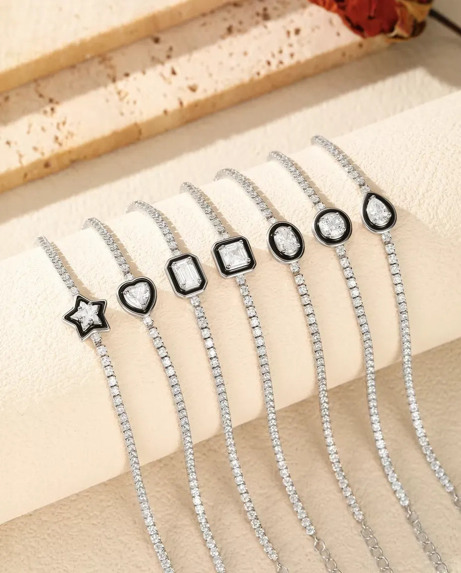 Bracciale Tennis in Argento 925 con Zirconia Centrale in Cornice Nera - le sette forme di pietra a confronto