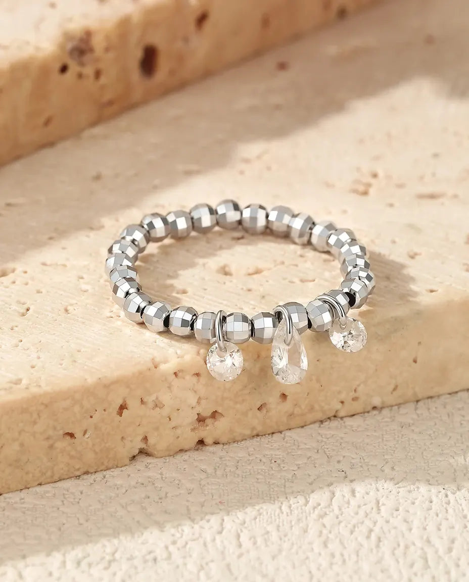 Anello Moissanite con Tre Pietre Pendenti Colore D, Fascia a Sfere Regolabile in Argento 925
