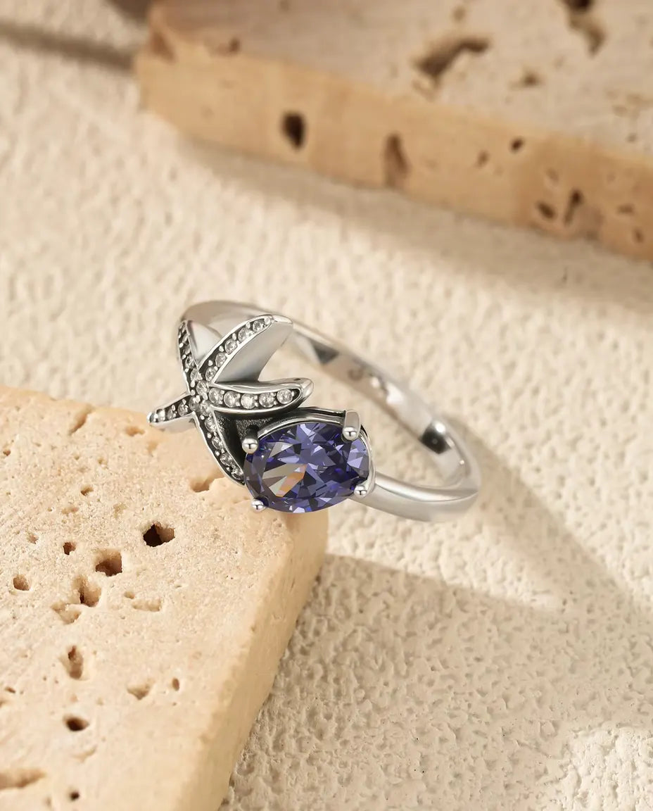 Anello Stella Marina - zircone viola ovale 5 x 7 mm e stella pavé, misure 5-9, argento 925
