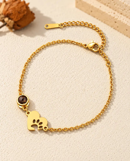 Bracciale ricordo per animali dorato con piastrina a cuore, impronta di zampa e catenella di estensione