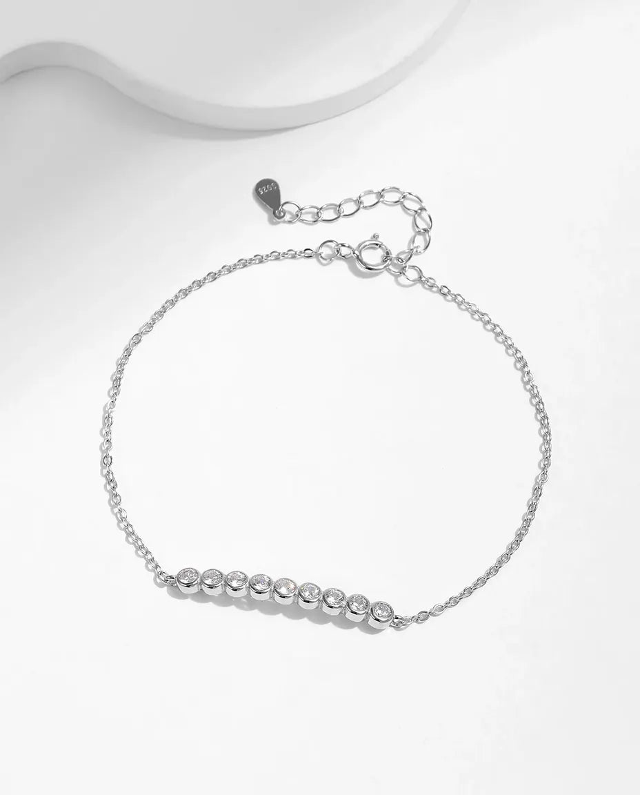 Bracciale Moissanite a Nove Pietre – tonde da 2,5 mm colore D a castone, argento 925 con prolunga