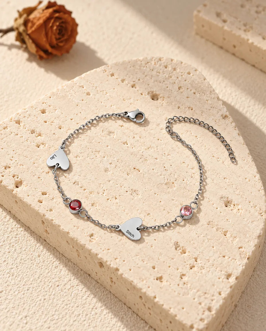 Bracciale con due nomi, con due cuori incisi alternati a due pietre di nascita