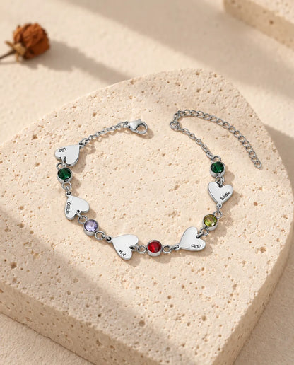 Bracciale con cinque nomi, con cinque cuori incisi alternati a cinque pietre di nascita
