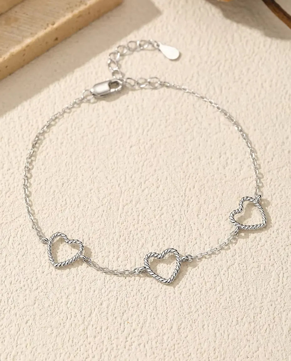 Bracciale con cuori - tre cuori aperti da 8 mm in argento intrecciato su catena forzatina in argento 925, 16 cm più 3 cm