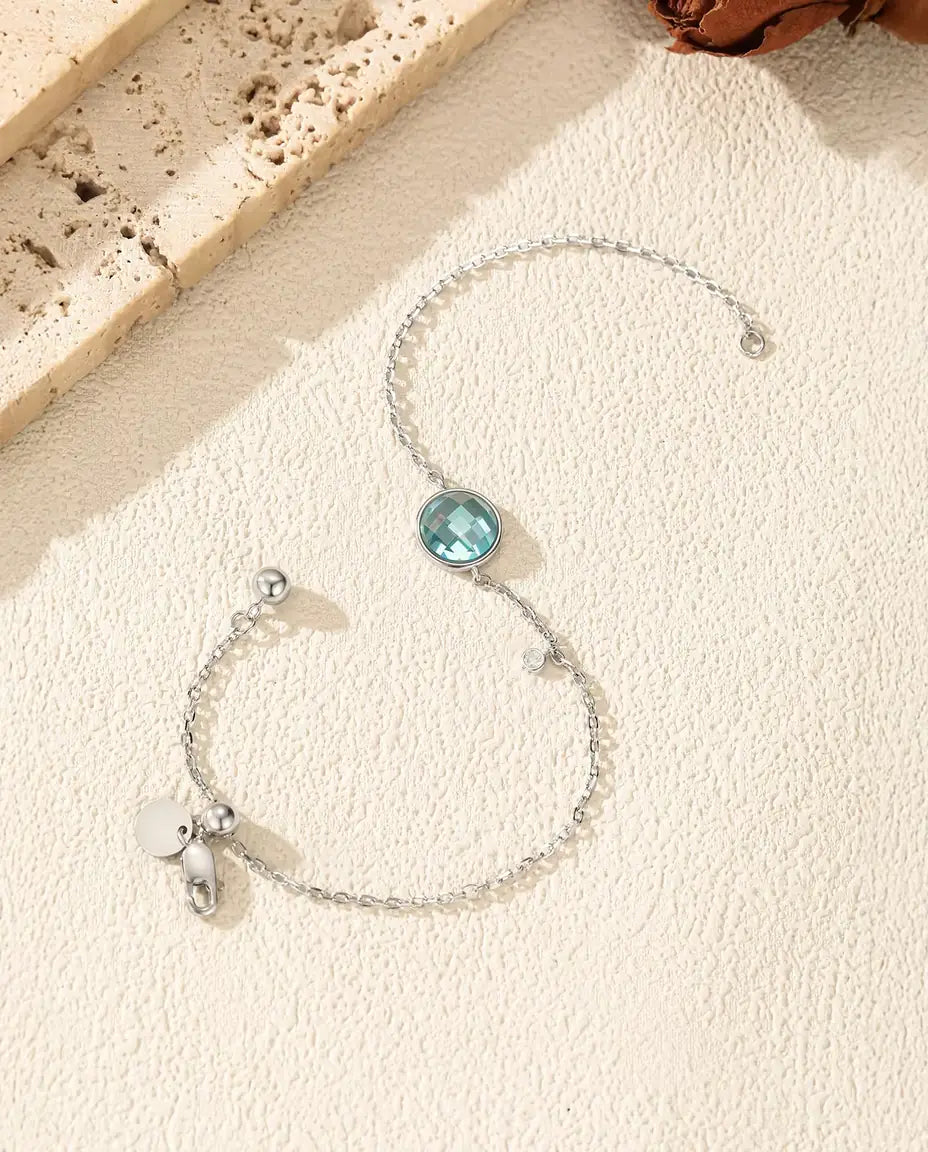 Bracciale con Zircone Blu - taglio scacchiera 8 mm su catena forzatina con chiusura scorrevole, argento 925