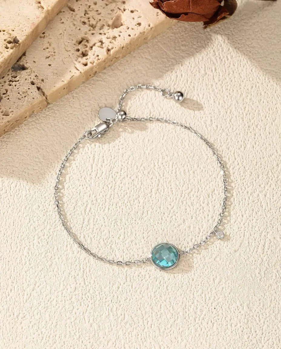 Bracciale con Zircone Blu - taglio scacchiera 8 mm su catena forzatina con chiusura scorrevole, argento 925