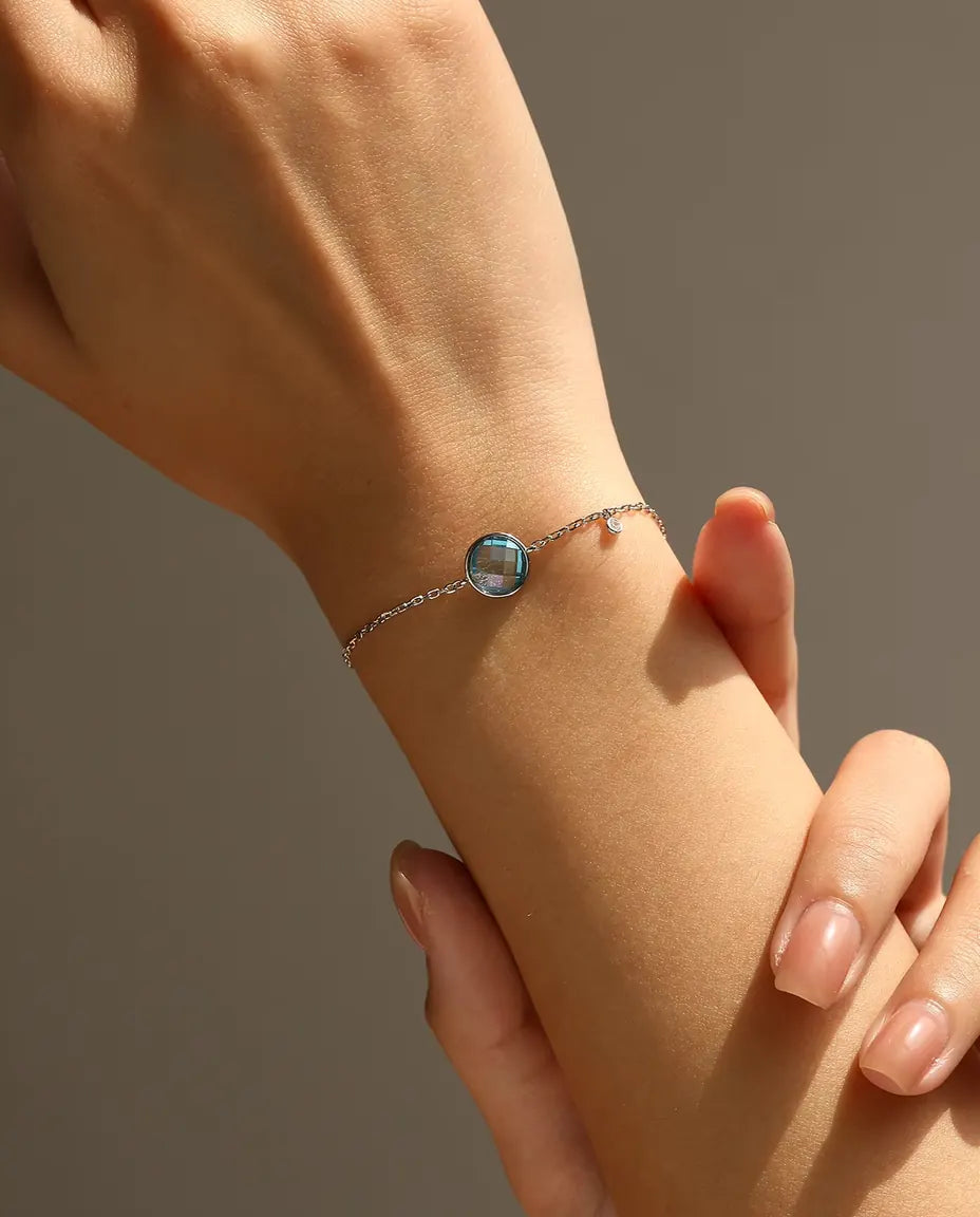 Bracciale con Zircone Blu - taglio scacchiera 8 mm su catena forzatina con chiusura scorrevole, argento 925
