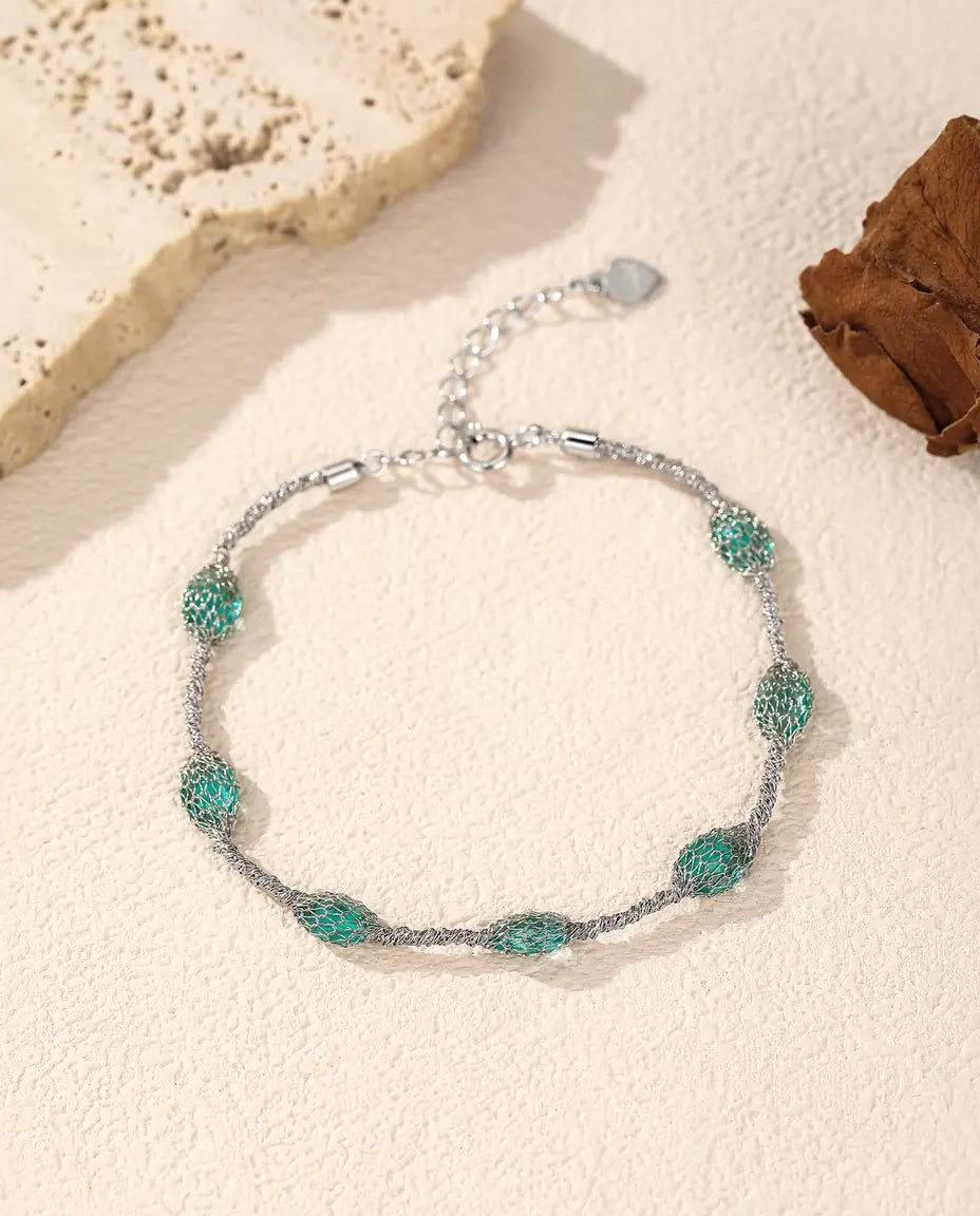 Bracciale Zirconi in Gabbia in Argento 925 - versione con zirconi verdi, più vicino alla rete d’argento