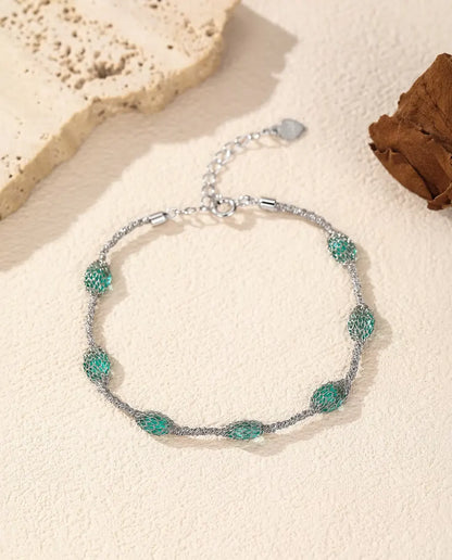 Bracciale Zirconi in Gabbia in Argento 925 - versione con zirconi verdi, più vicino alla rete d’argento