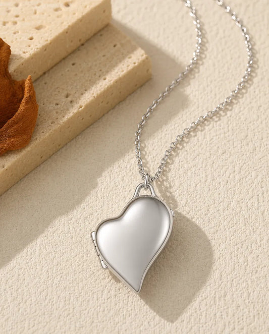 Ciondolo portafoto cuore asimmetrico con 2 foto, collana in acciaio argentato o dorato