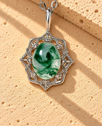 Collana con Ciondolo Vintage in Agata Muschiata e Argento 925 - primo piano dell’agata muschiata e della sua montatura