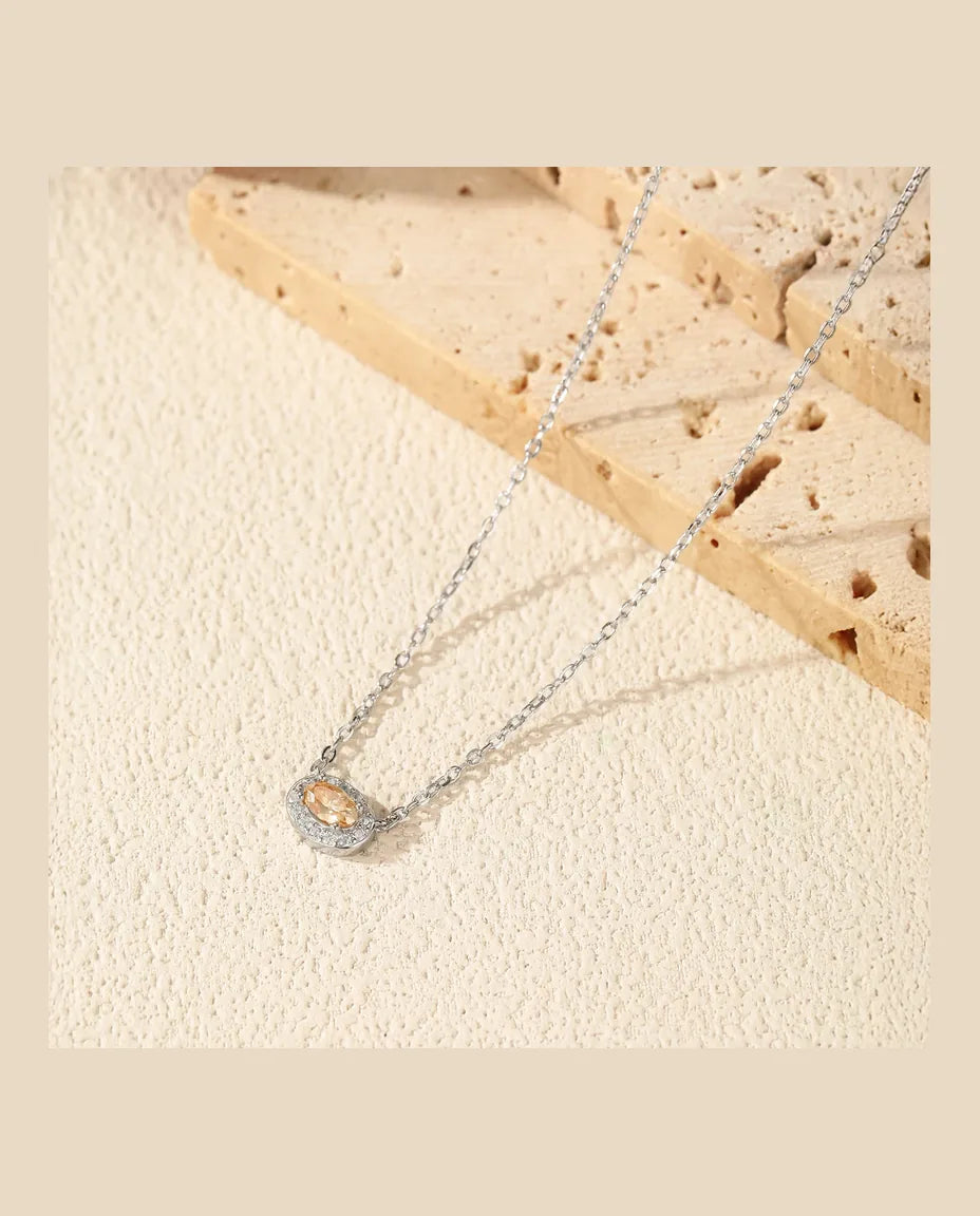 Collana Moissanite Gialla Ovale – montatura est-ovest con halo in argento 925, catena 40+5 cm