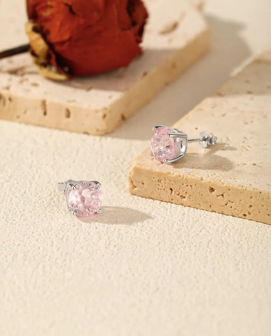 Orecchini a Lobo con Zirconia Rosa in Argento 925 - la coppia su pietra chiara
