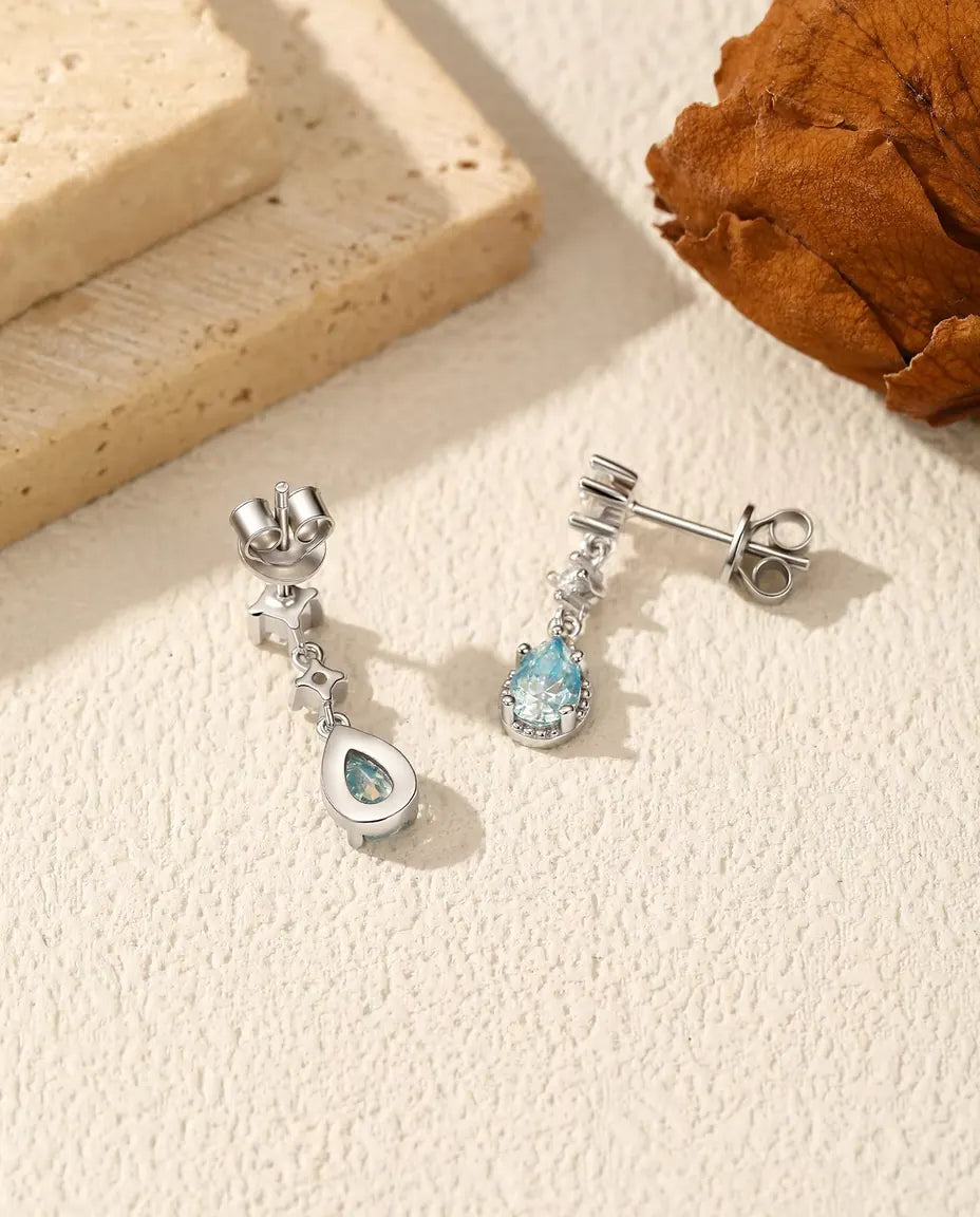 Orecchini moissanite azzurro aqua - una goccia da 0,50 ct 4 x 6 mm per orecchino con accenti in zircone, argento 925, 18 mm